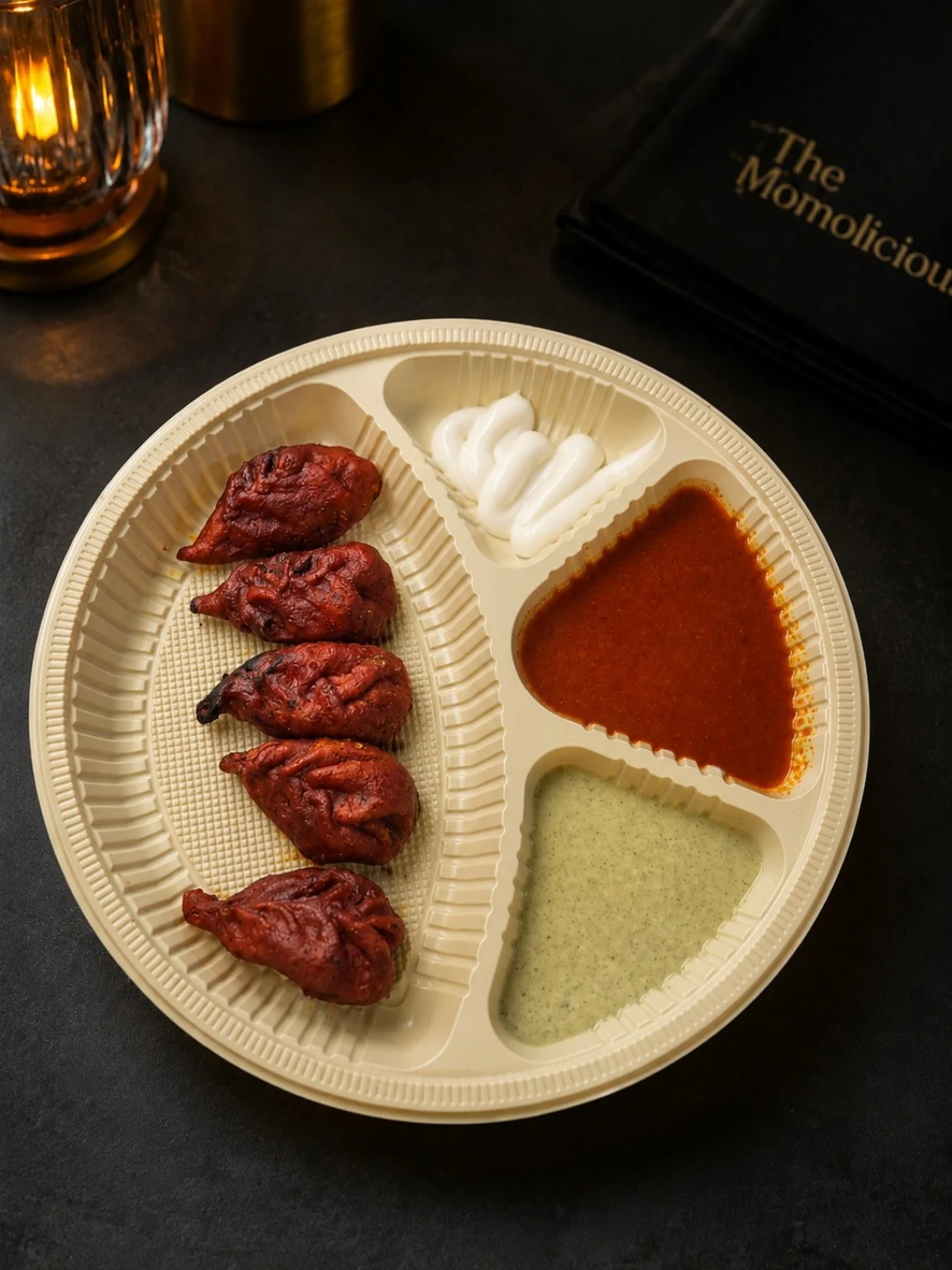 The Momolicious tandoori momos with chutney